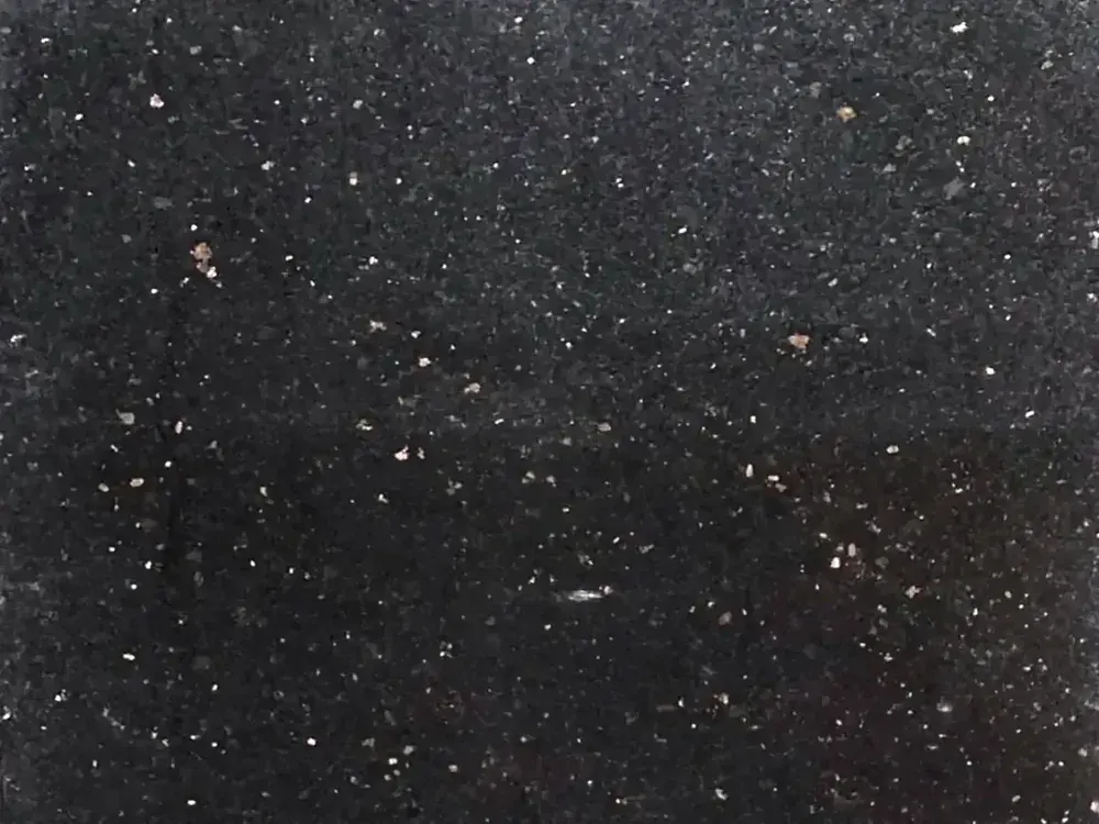Black Galaxy granite slab with gold flecks, a popular kitchen countertop colour in Dubai