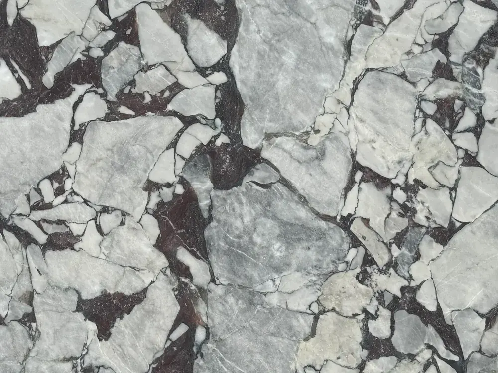 Calacatta Viola marble slab with violet and burgundy veining