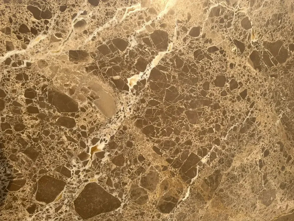 Dark Emperador marble slab with warm brown veining for kitchen countertops in Dubai