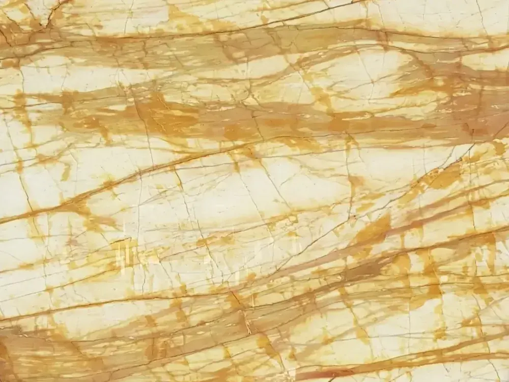 Giallo Siena marble slab used for gold accents in waterjet marble inlay designs