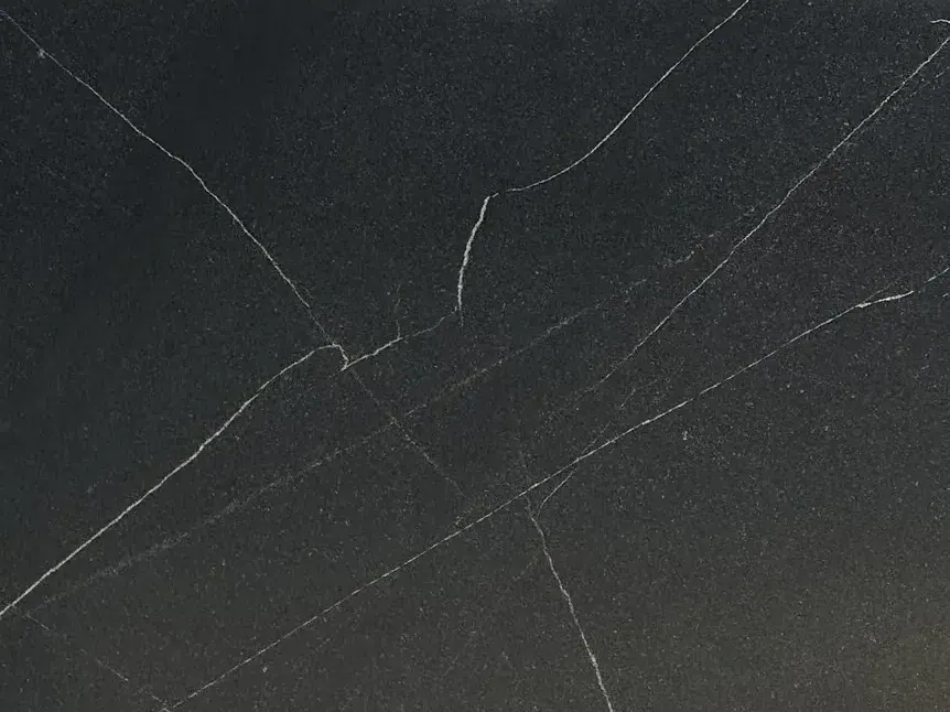 Vincent Black granite slab with fine white hairline veining