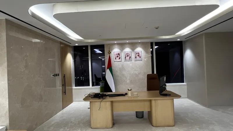 Executive office with crema marble wall cladding
